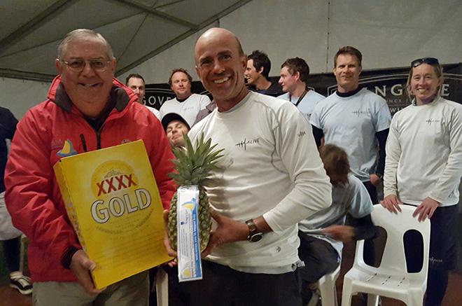 RQYS Vice Commodore Mark Gallagher presents the customary pineapple and XXXX to Duncan Hine © Brisbane to Keppel Tropical Yacht Race http://www.brisbanetokeppel.com